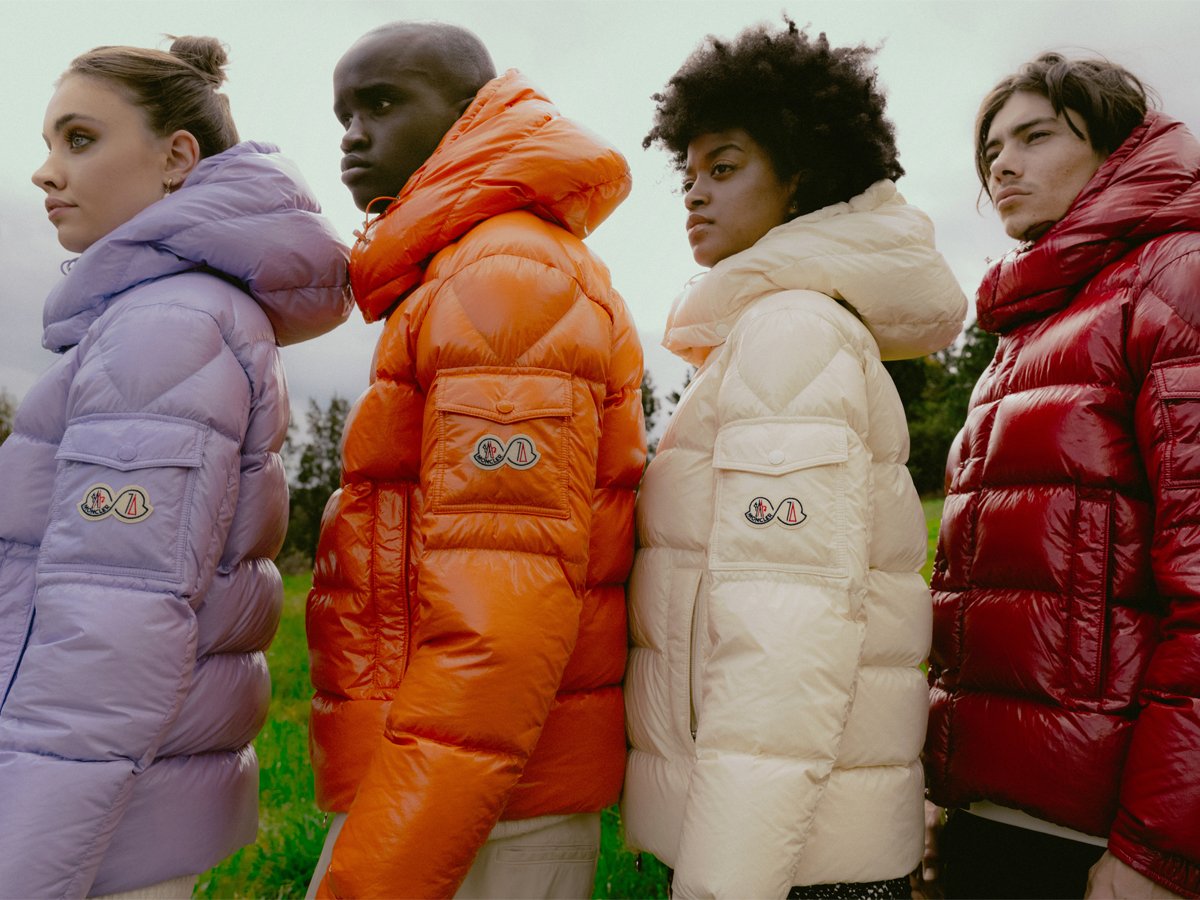 Models wearing colourful Moncler Maya 70 down jackets outdoors.