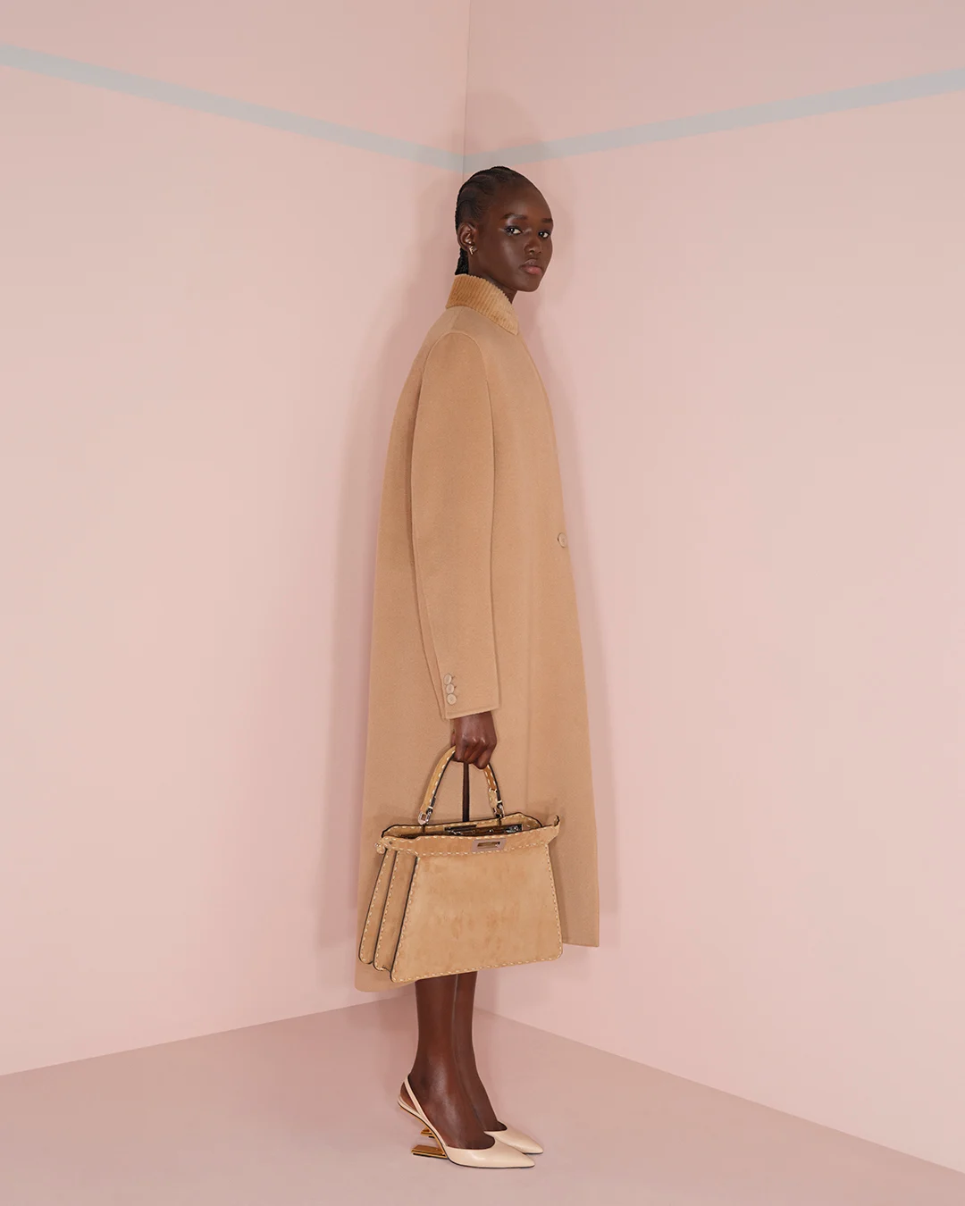 Camel suede Fendi Peekaboo ISeeU Medium bag styled with a matching coat.