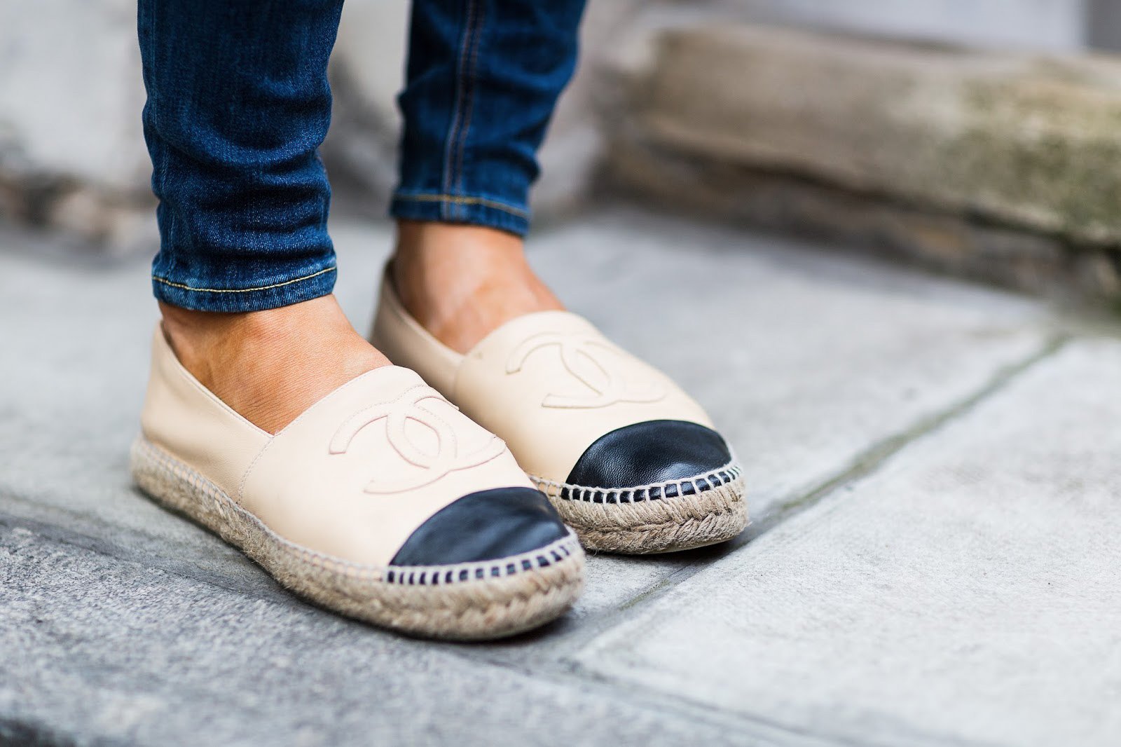 Chanel lambskin espadrilles worn on foot to demonstrate fit.