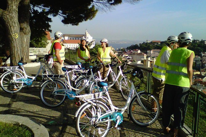 Guided electric-bike tour climbing Lisbon