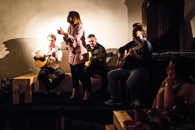 Intimate Fado performance during an evening Lisbon food tour