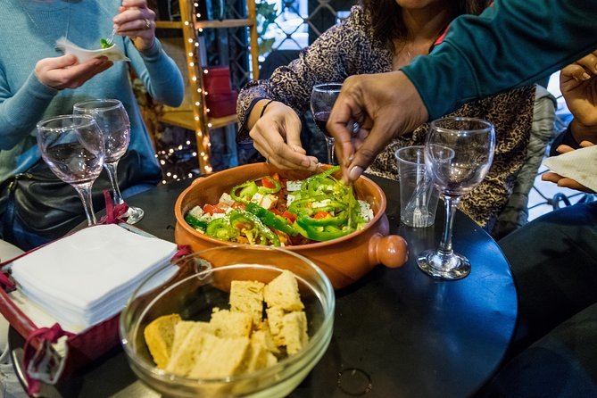 Greek cheeses, bread and local delicacies on an Athens food tour