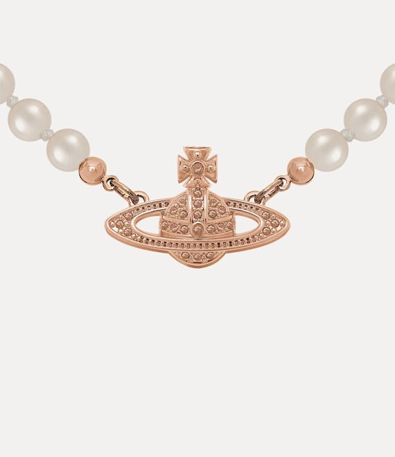 Vivienne Westwood pearl necklace clasp and chain shown in close-up