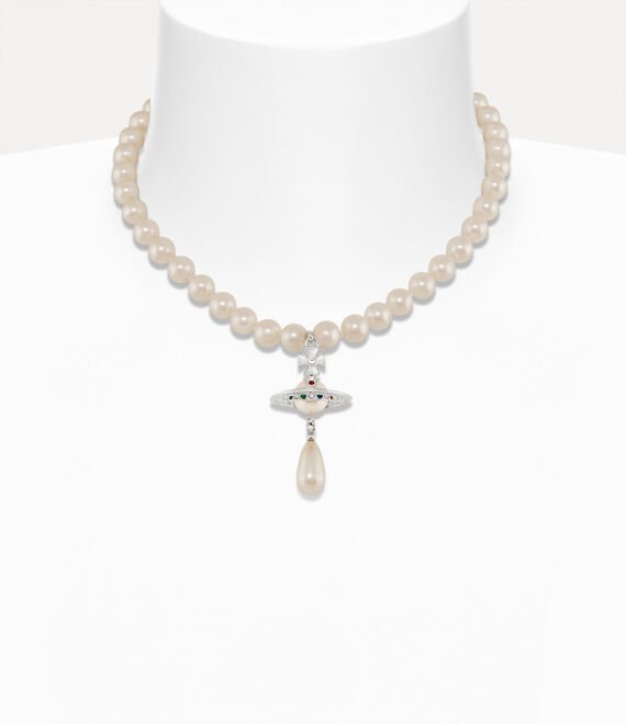 Model wearing a statement Vivienne Westwood pearl necklace