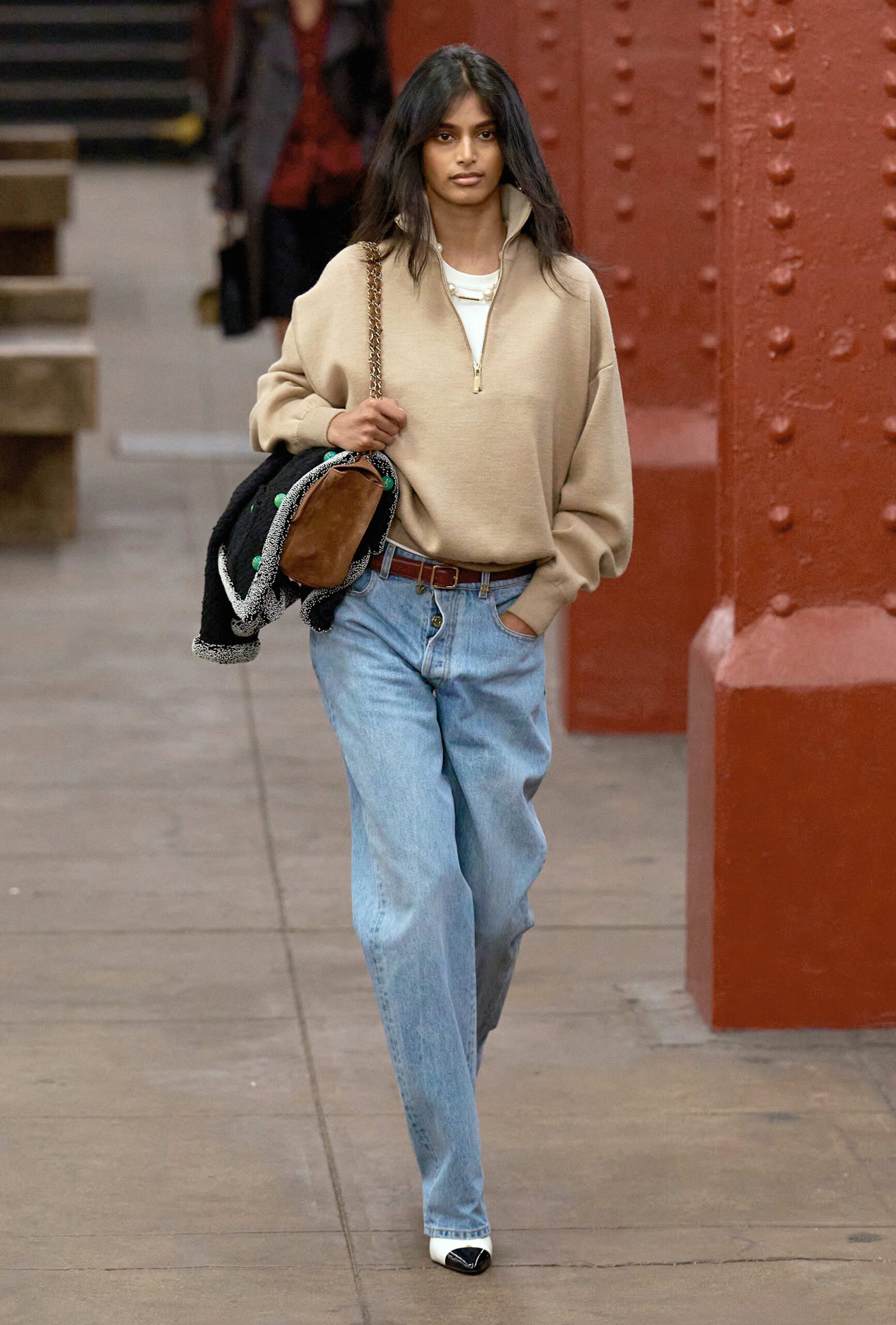 Camel suede Chanel Maxi Flap Bag shown with a Chanel runway look