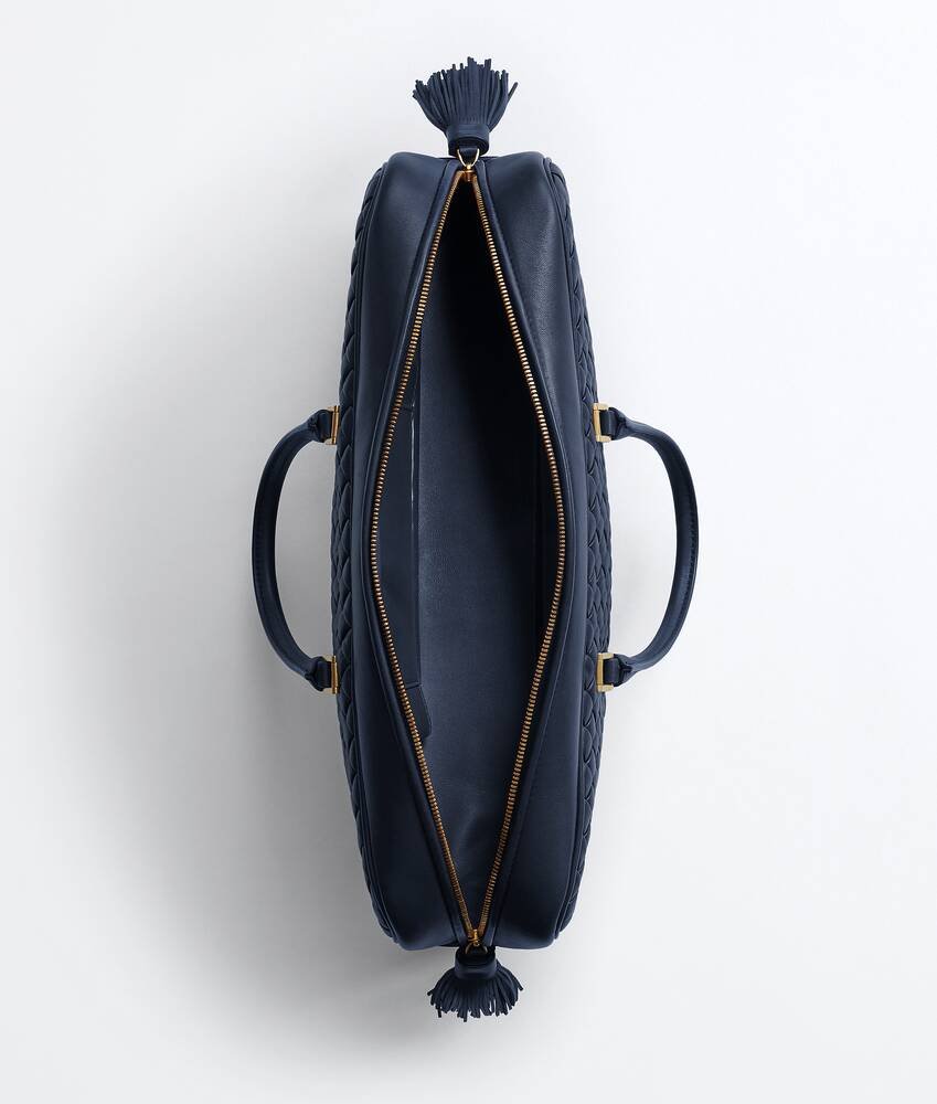 Petroleum Bottega Veneta Elio shown with woven leather and handle attachments
