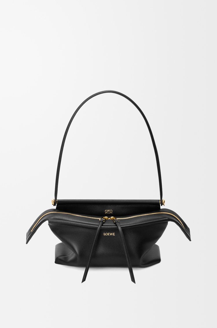 Black Loewe Small Whisker Bag in glazed calfskin on a clean background