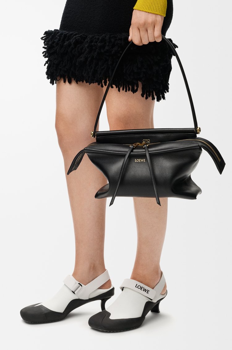 Black Loewe Small Whisker Bag in glazed calfskin on a clean background