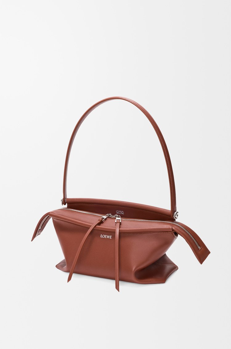Cognac Loewe Whisker Bag shown with its detachable shoulder strap