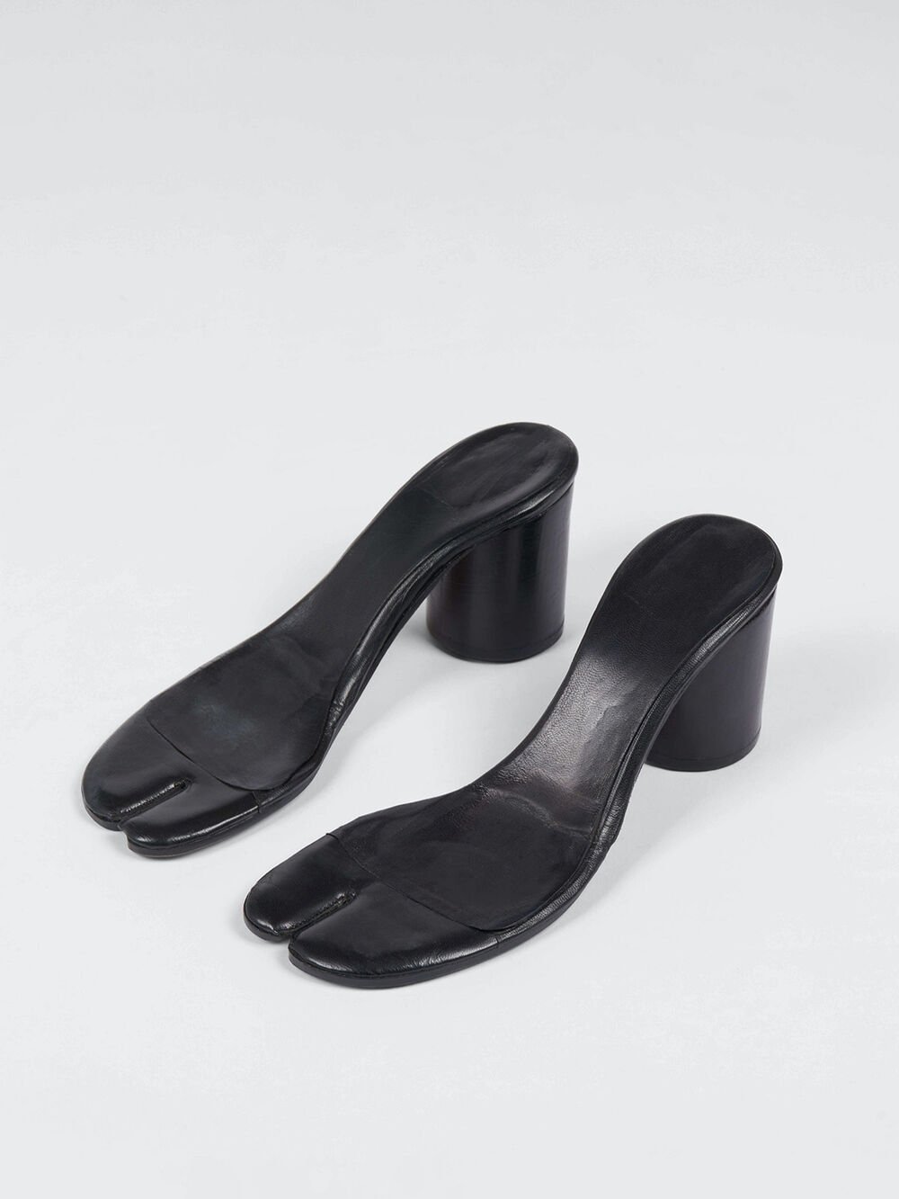 Maison Margiela artisan working on Tabi shoe construction