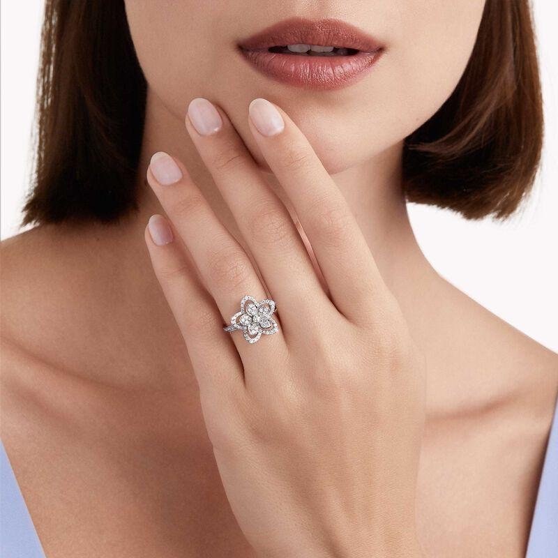 Model wearing a Graff Wild Flower diamond ring.
