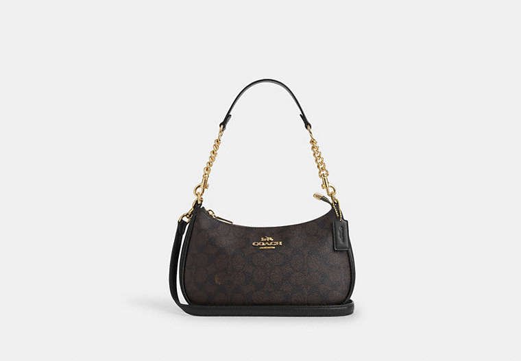 Coach Teri Shoulder Bag in Signature coated canvas with leather trim.
