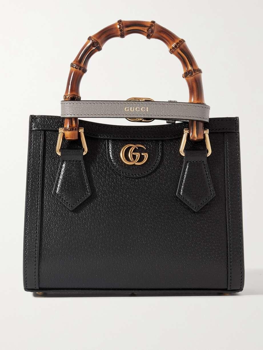 Black Gucci Diana small tote bag with bamboo handles and leather handle belts.