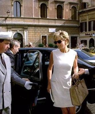 Princess Diana carrying the original Gucci bamboo-handle tote.
