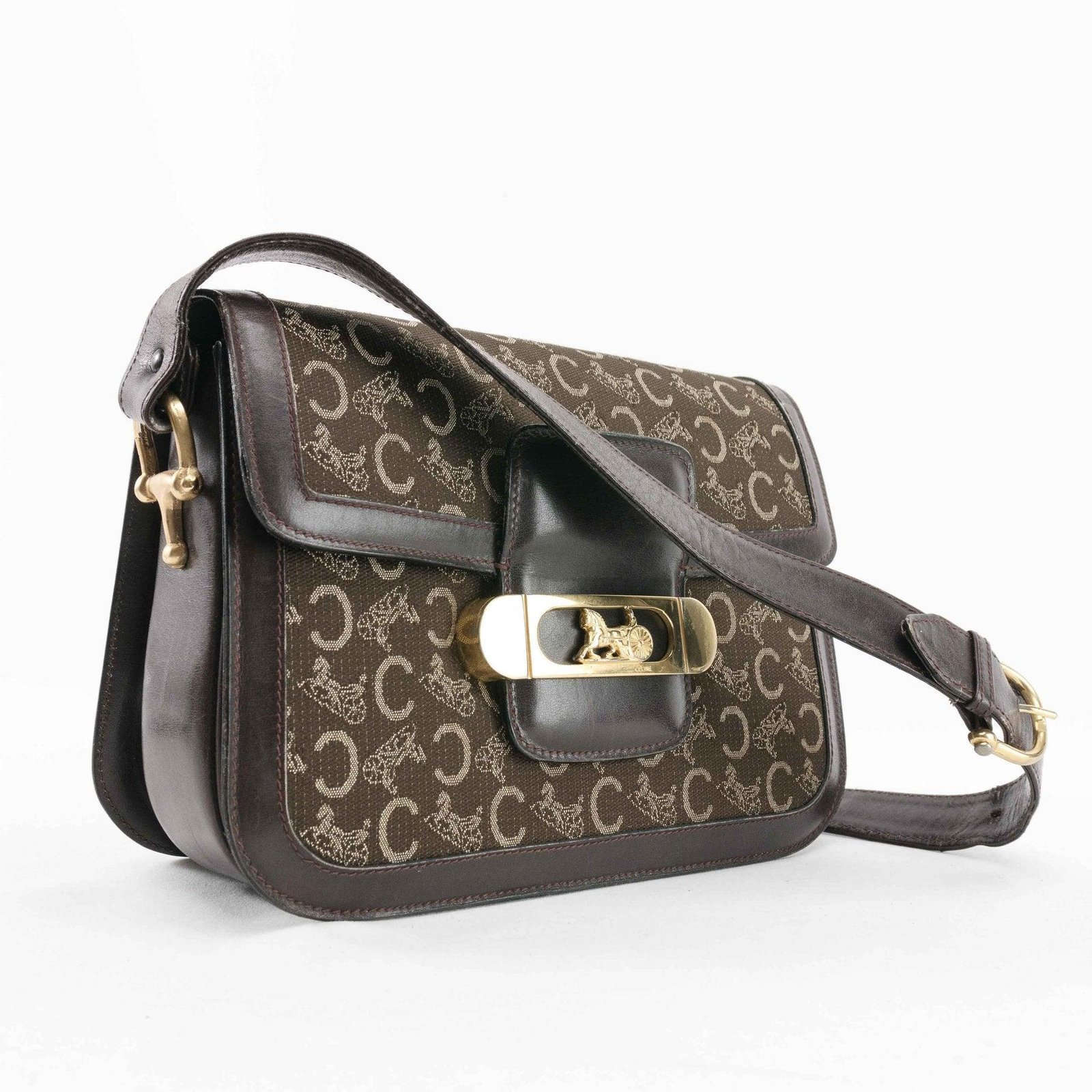 Vintage Celine monogram shoulder bag featuring historic Triomphe hardware.