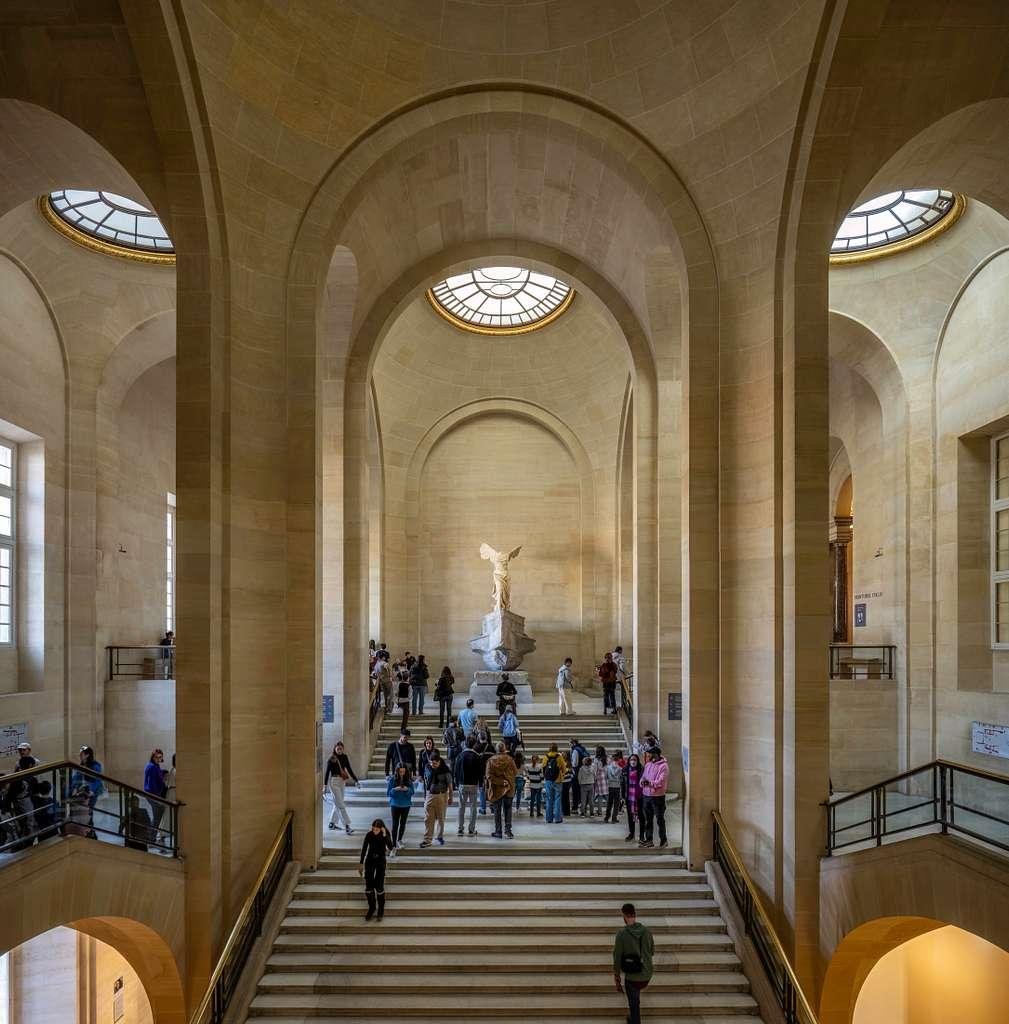 Famous masterpieces displayed inside the Louvre Museum.