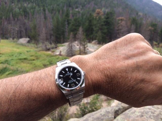 Rolex Explorer 36 with black 3-6-9 dial worn outdoors.