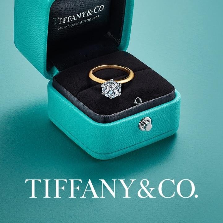 Tiffany diamond engagement ring displayed in its signature Blue Box.