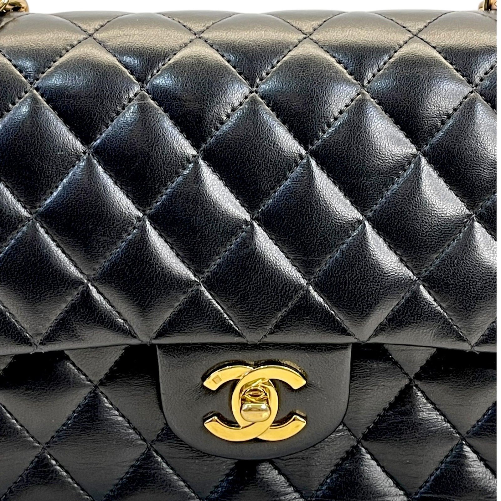 Close-up of Chanel Classic Flap quilting, turn-lock and leather-threaded chain.