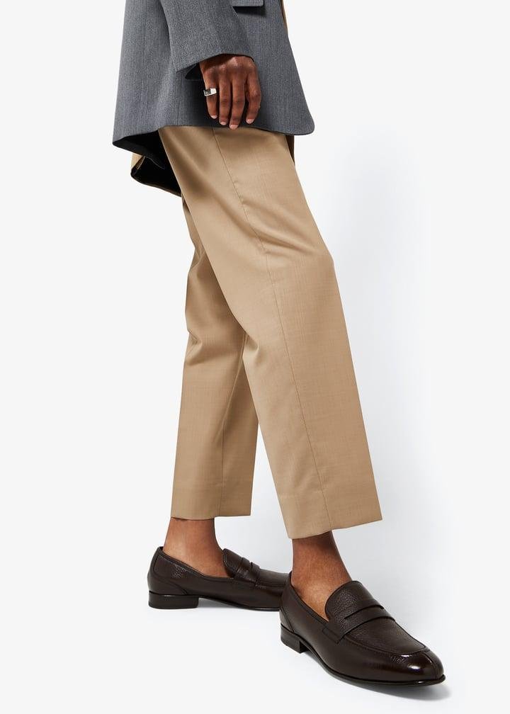 Models wearing Bally loafers, moccasins and sneakers.
