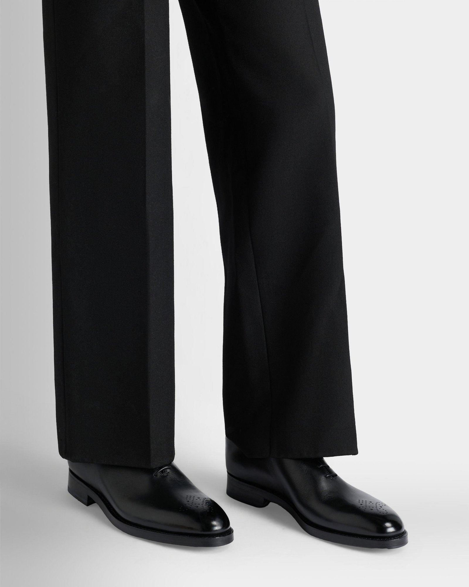 Models styling Bally men’s dress shoes, loafers and sneakers.