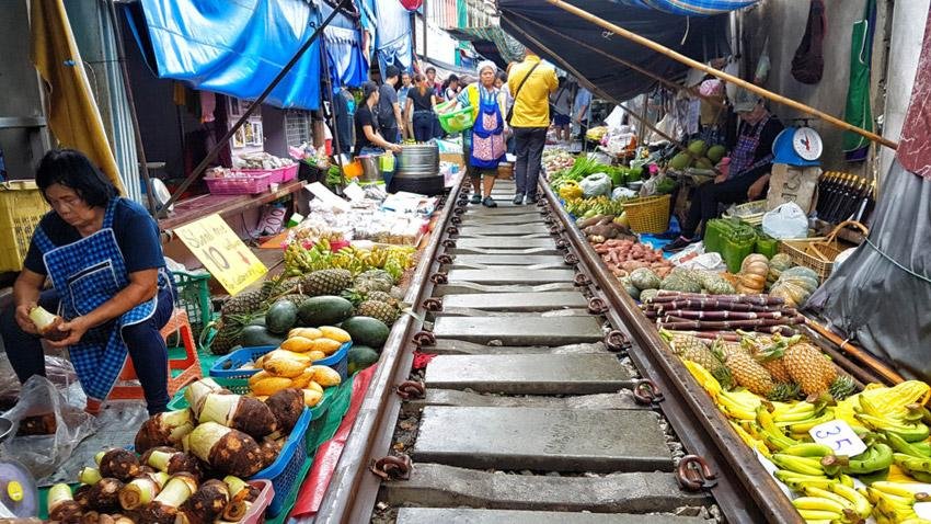 Fresh food stalls at Maeklong Railway Market in Samut Songkhram.