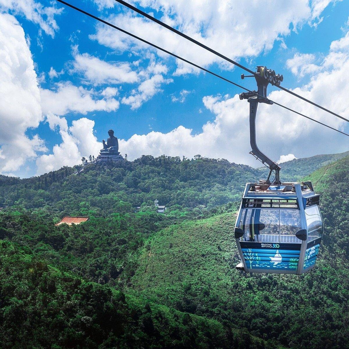Ngong Ping 360 cable car travelling above Lantau Island.