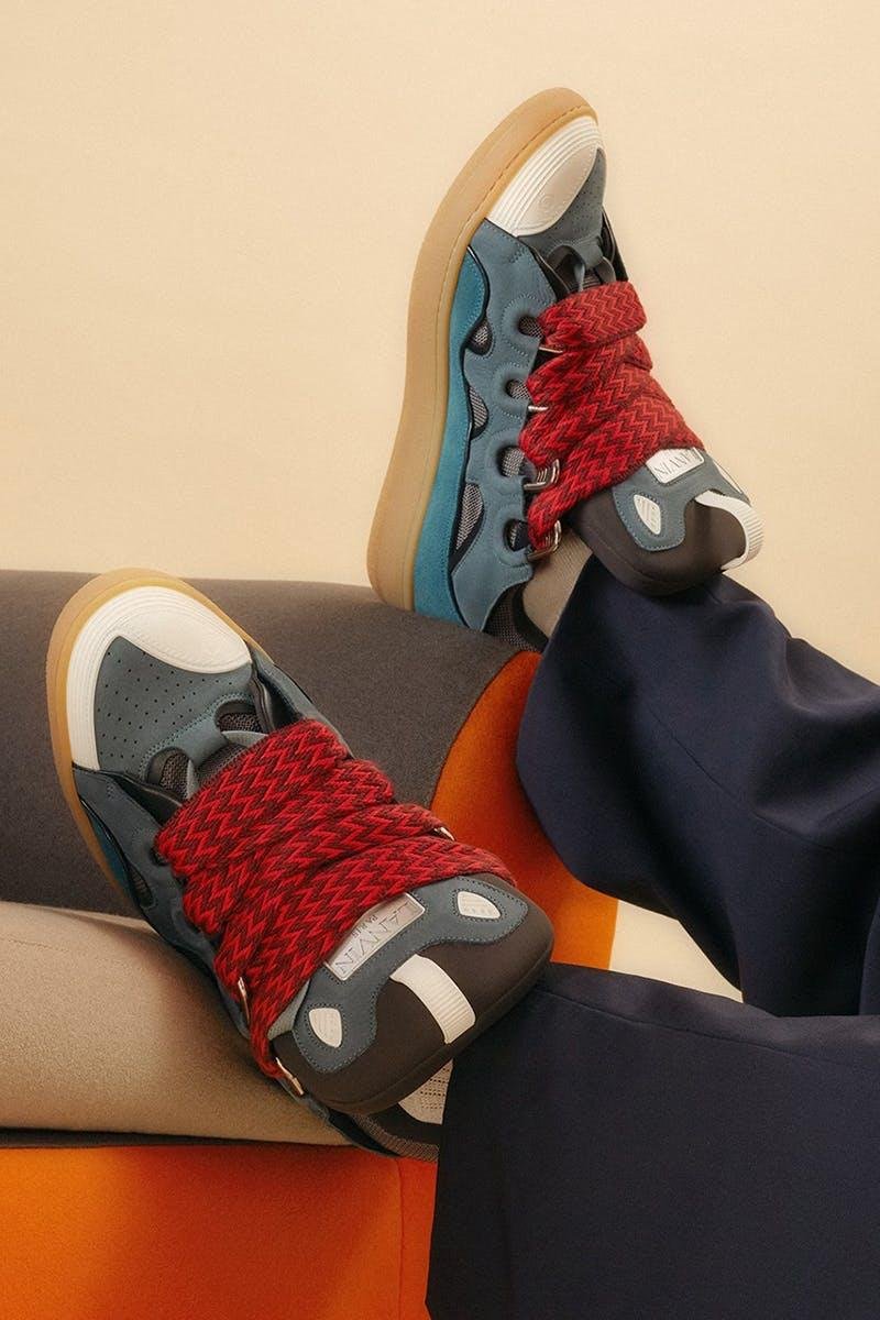 Lanvin Curb sneakers worn with tailored trousers