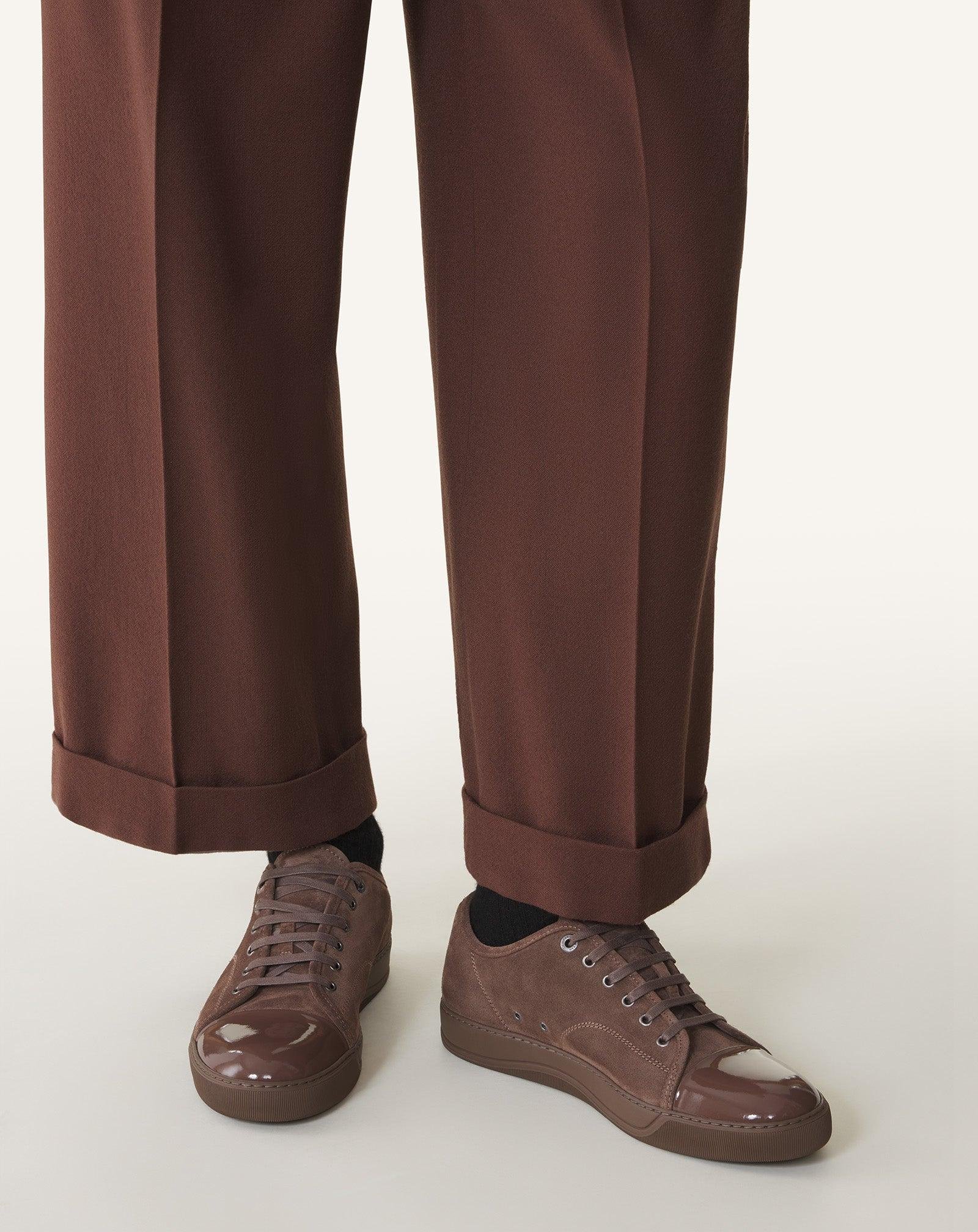 Brown Lanvin leather shoes worn with relaxed tailored trousers