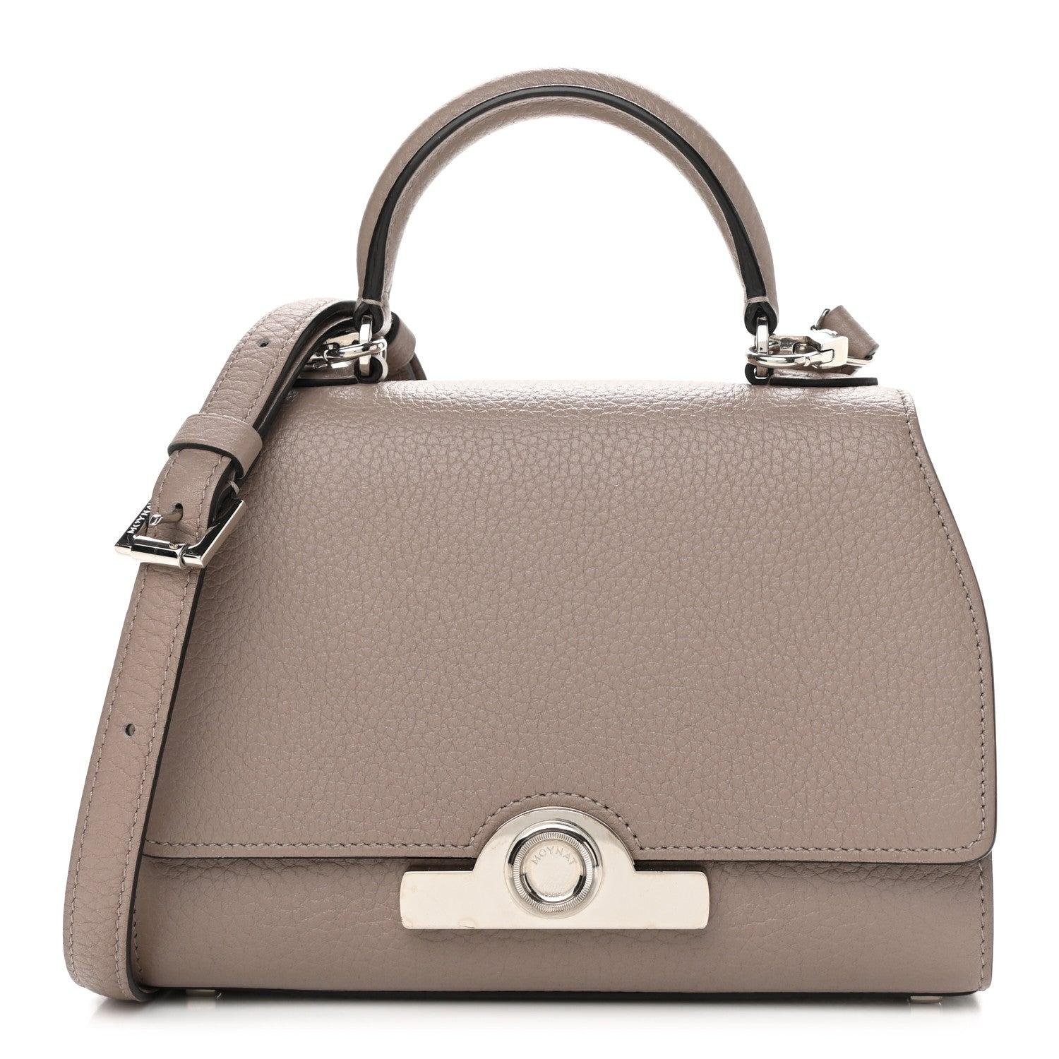 Structured Moynat Réjane handbag with curved flap and metal clasp.