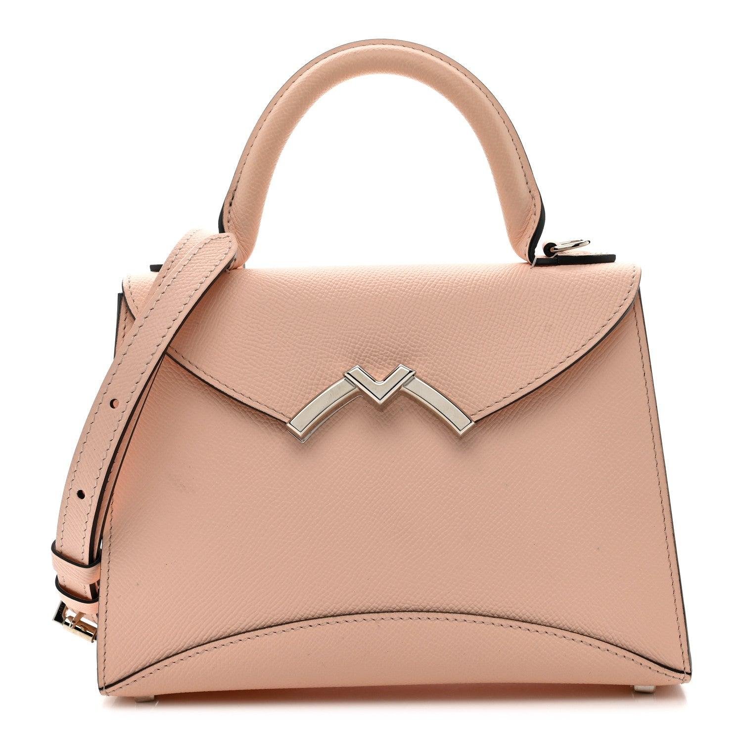 Moynat Gabrielle handbag with curved front stitching and metal M closure.