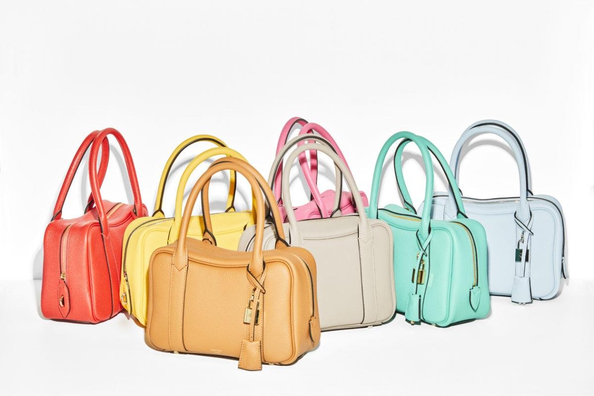 Compact Moynat Mignon bags in a range of coloured leathers.