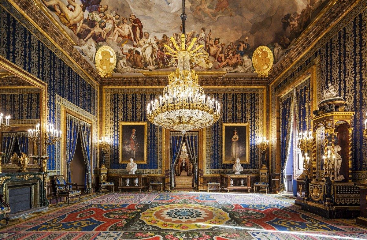Chandelier and painted ceiling inside the Royal Palace of Madrid