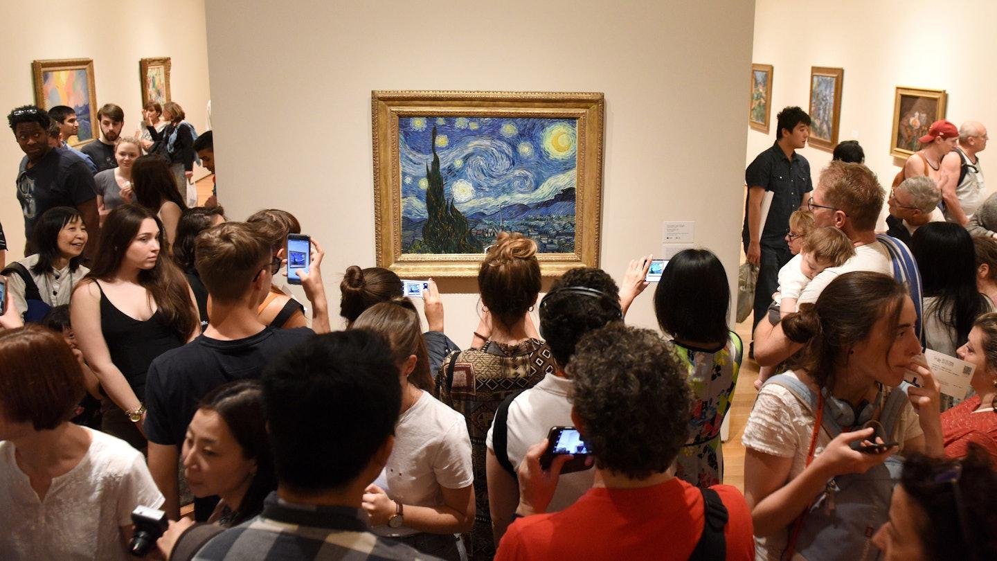 Crowd gathered around The Starry Night at MoMA