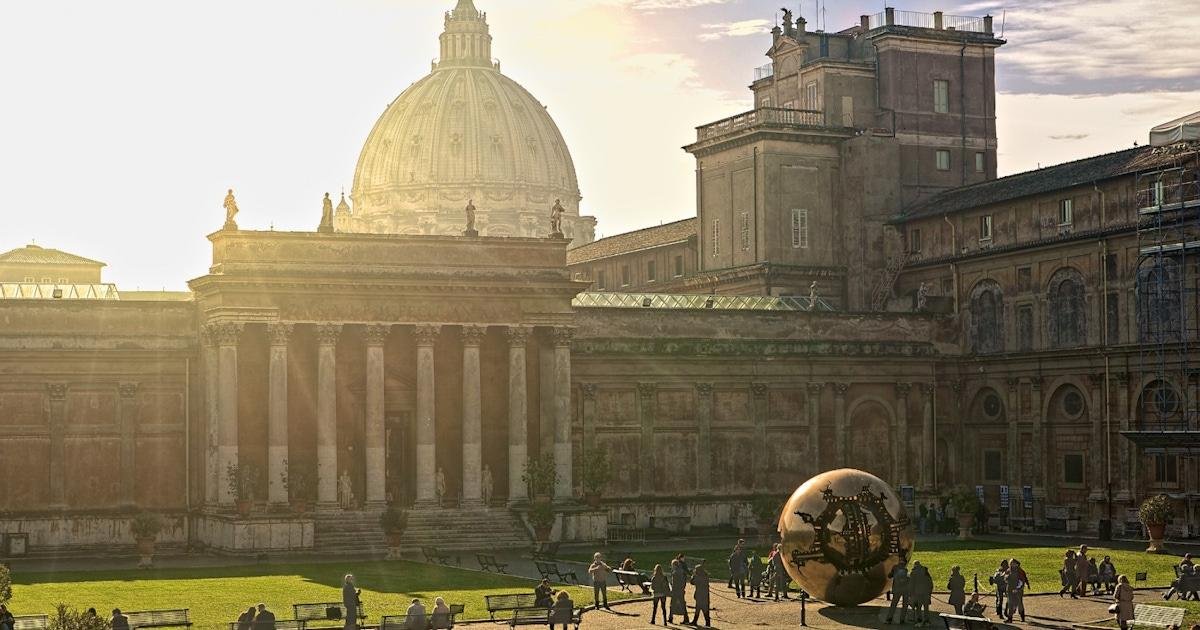 St. Peter’s Basilica and the Vatican Museums at sunset.