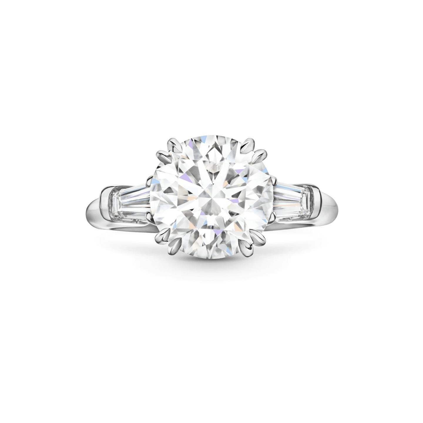 Classic Winston diamond engagement ring with shaped side stones.