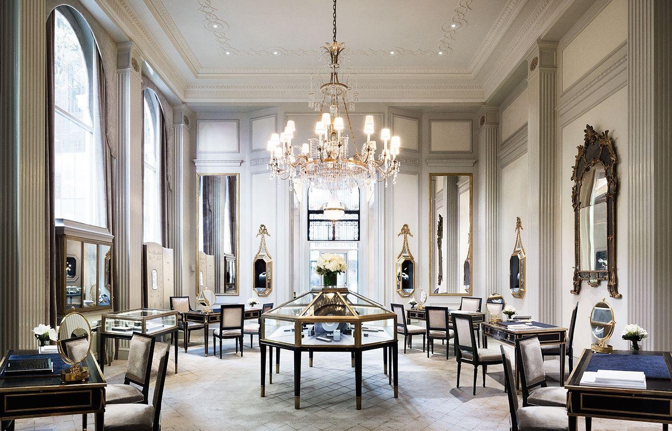 Harry Winston salon interior with chandeliers and private consultation tables.