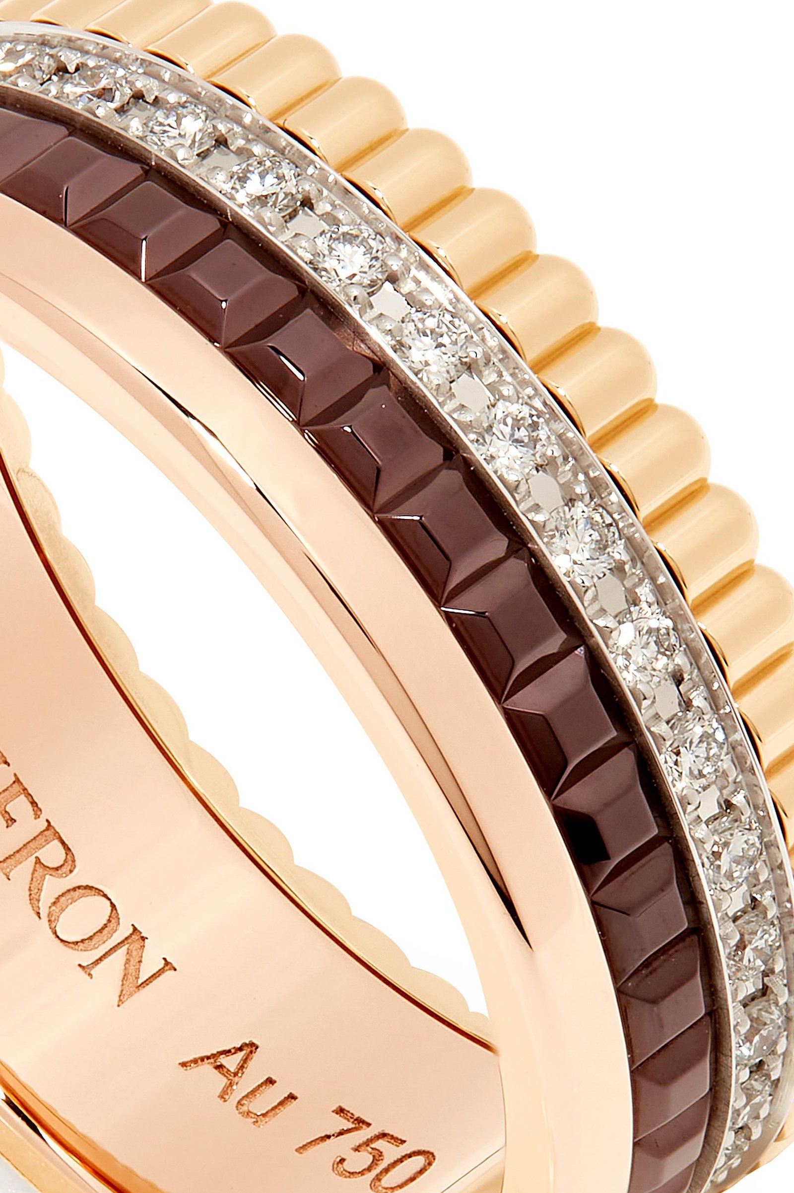Close-up of the ceramic, diamond and gold textures on a Boucheron Quatre ring.