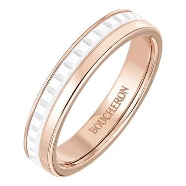 Boucheron Quatre White Edition ring on a clean background.