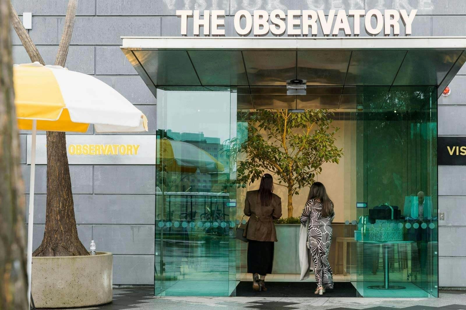 Visitors entering the Observatory visitor facility near Melbourne Gardens.