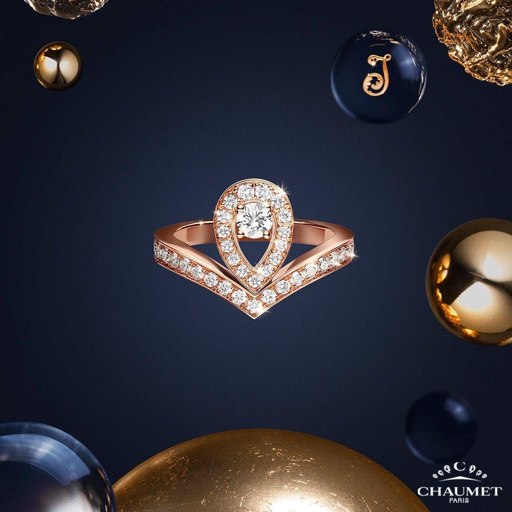 Chaumet Joséphine and Bee de Chaumet rings on midnight-blue silk.