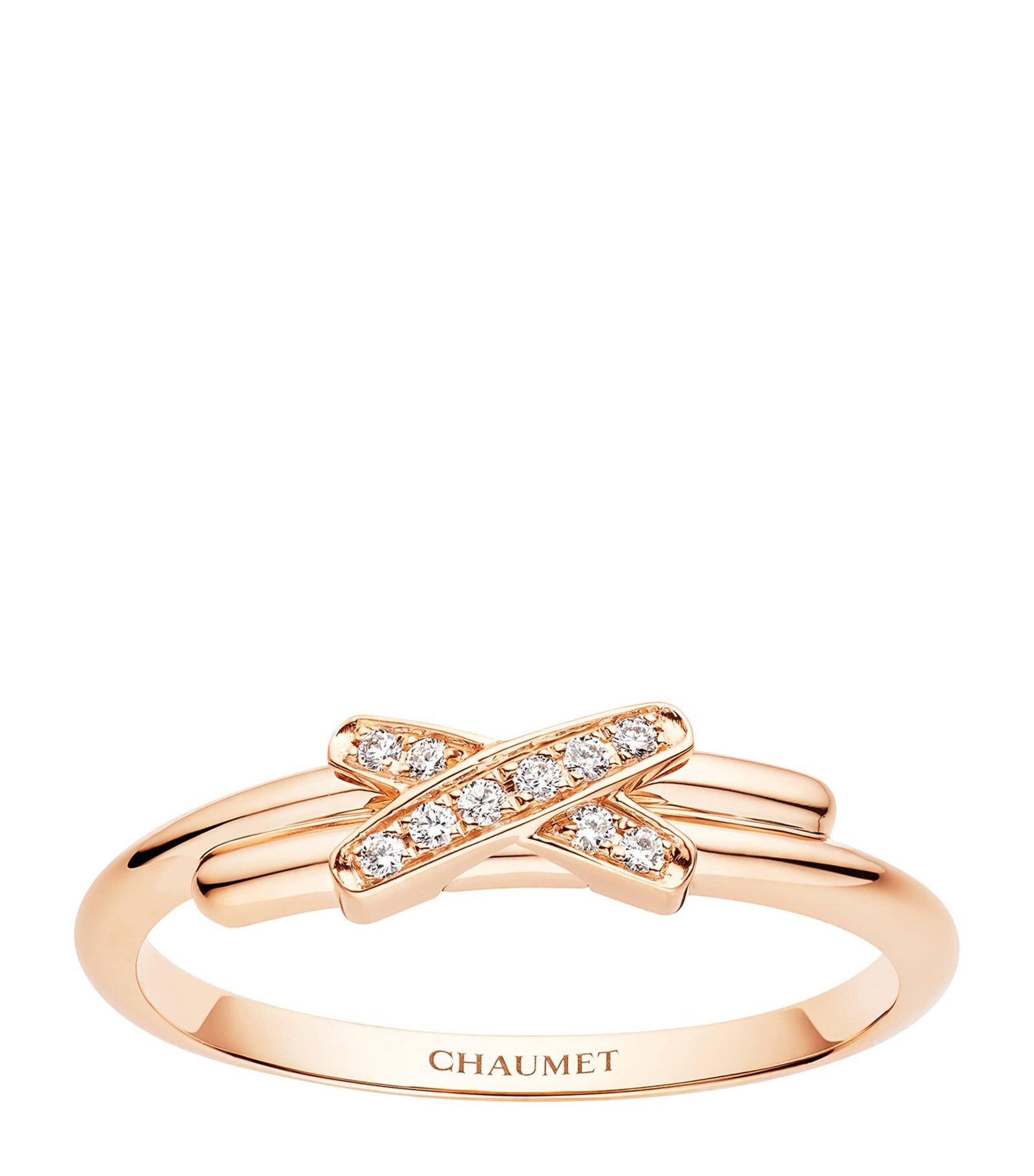Chaumet Jeux de Liens rose-gold diamond ring on a clean background.