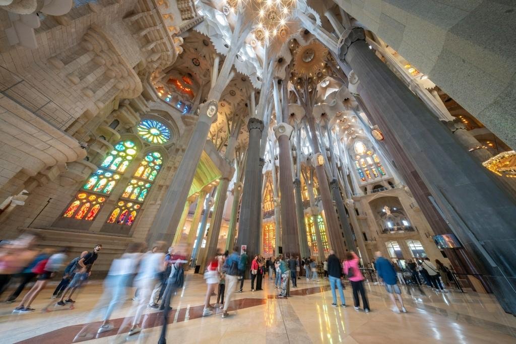 Visitors taking time to observe the interior of the Sagrada Familia