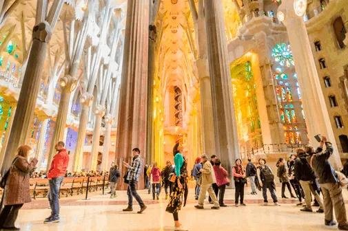 Visitors inside the accessible main level of the Sagrada Familia