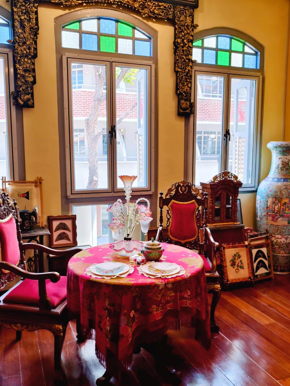 Intimate, densely furnished room inside The Intan.