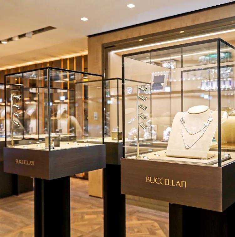 Buccellati rings displayed together in a luxury jewellery setting