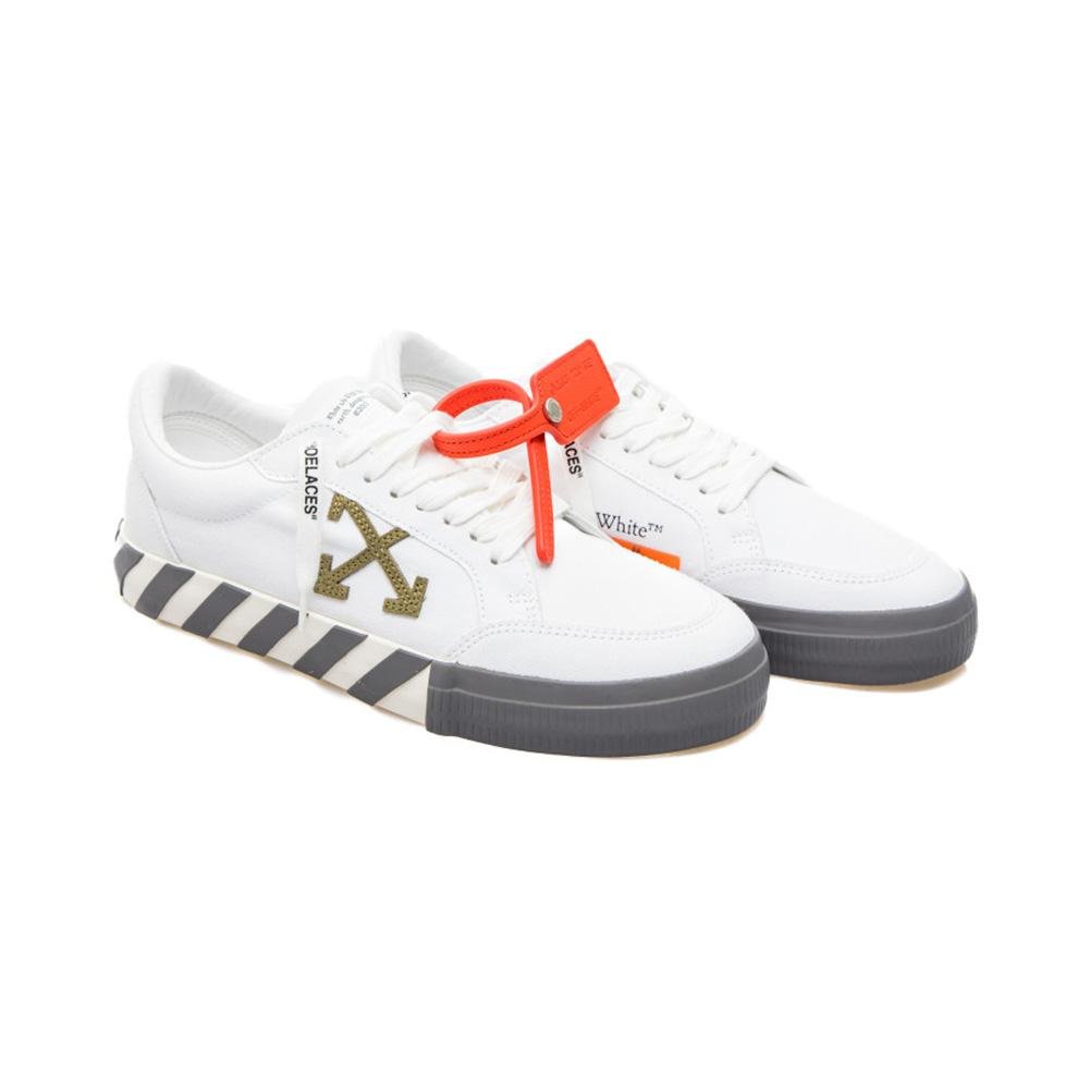 Off-White sneakers displaying Arrow branding and zip-tie details.