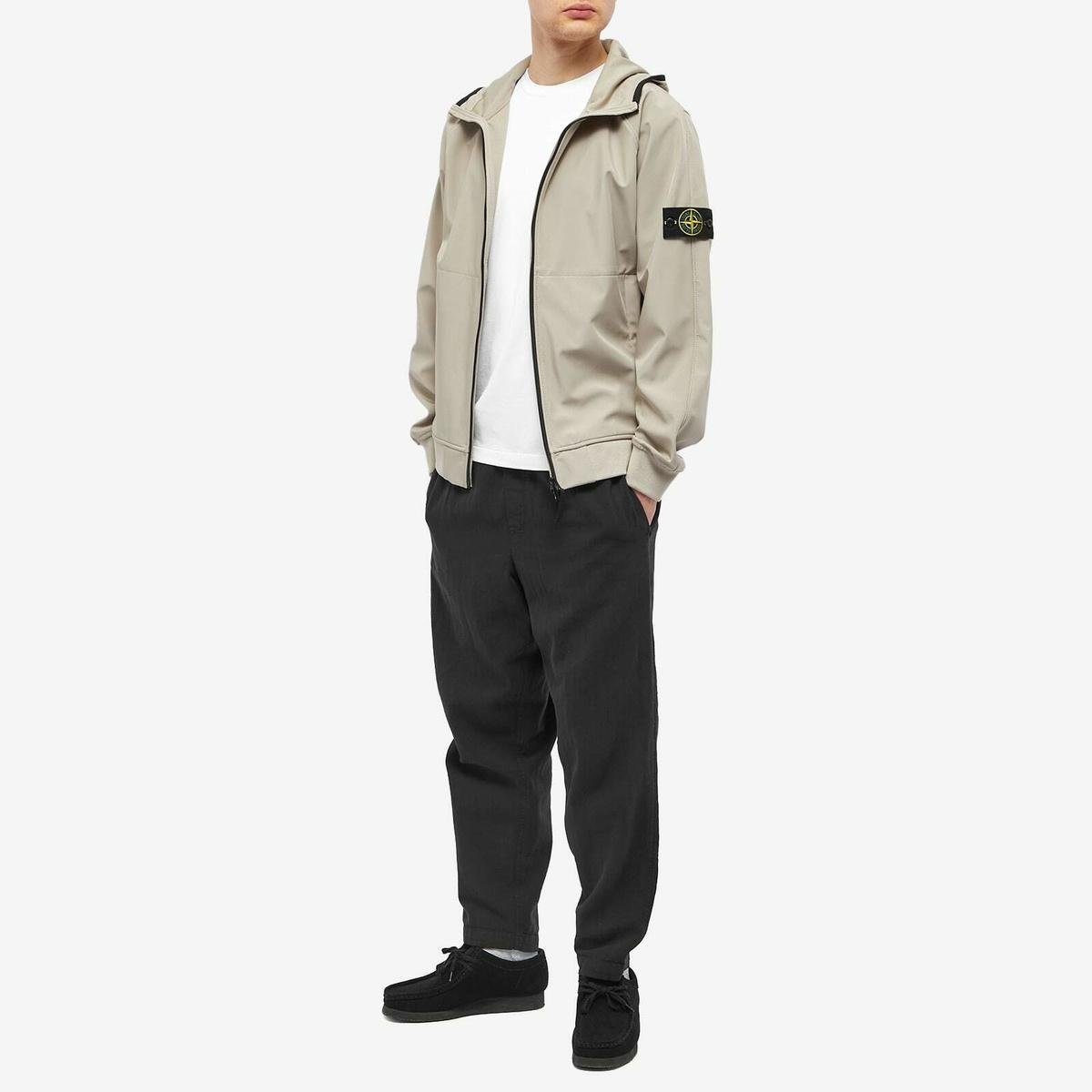 Stone Island jackets styled with contemporary casual clothing.