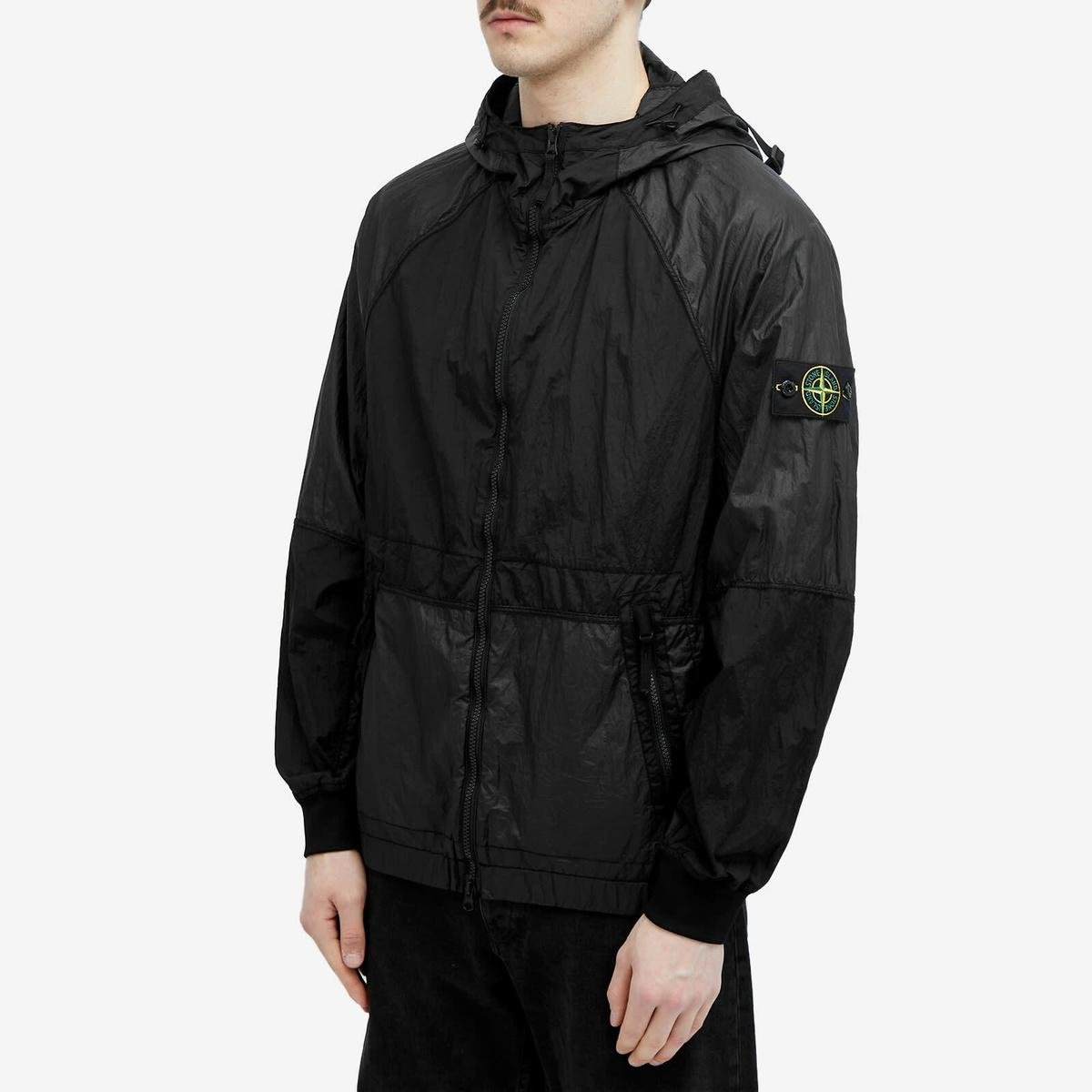 Stone Island technical jacket displayed to show its fabric and construction.