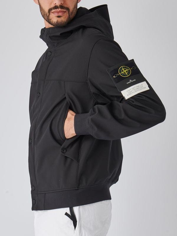 Stone Island jacket photographed with a clear view of its technical fabric.